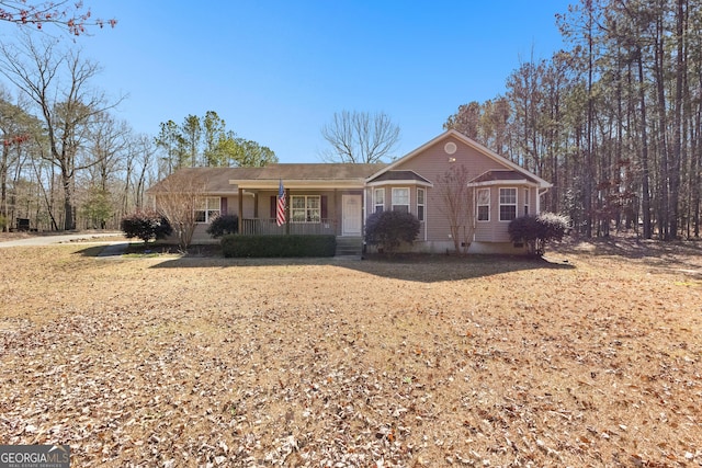 single story home featuring a porch