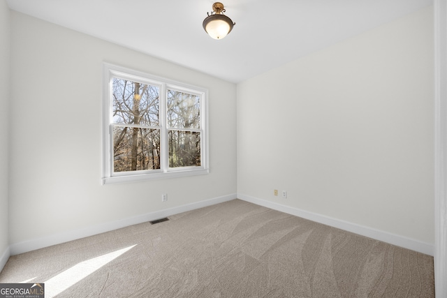 view of carpeted spare room