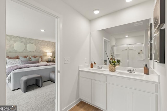 bathroom with vanity and walk in shower