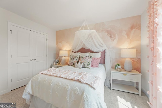 carpeted bedroom with a closet