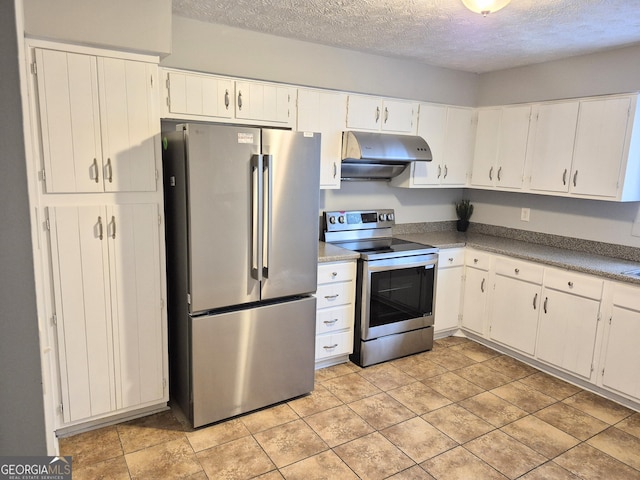 kitchen with a textured ceiling, appliances with stainless steel finishes, white cabinetry, and range hood