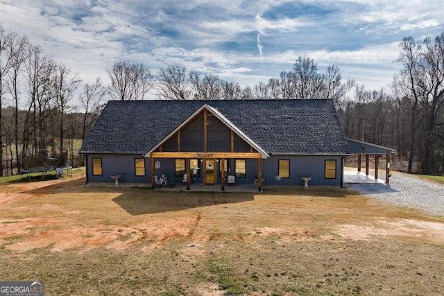 modern farmhouse with a trampoline and a front lawn