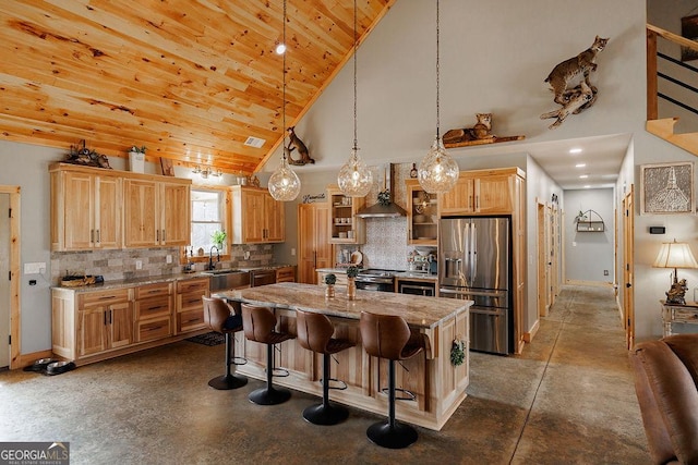 4059 Wildcat Bridge Rd, Royston, GA 30662 - kitchen with wall chimney range hood, appliances with stainless steel finishes, high vaulted ceiling, concrete floors, and a center island