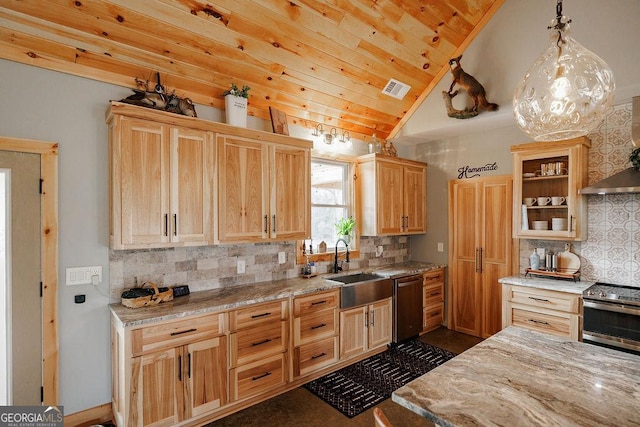 kitchen featuring sink, light stone counters, decorative light fixtures, vaulted ceiling, and stainless steel appliances