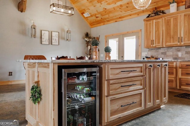 kitchen with wine cooler, light brown cabinetry, lofted ceiling, and french doors