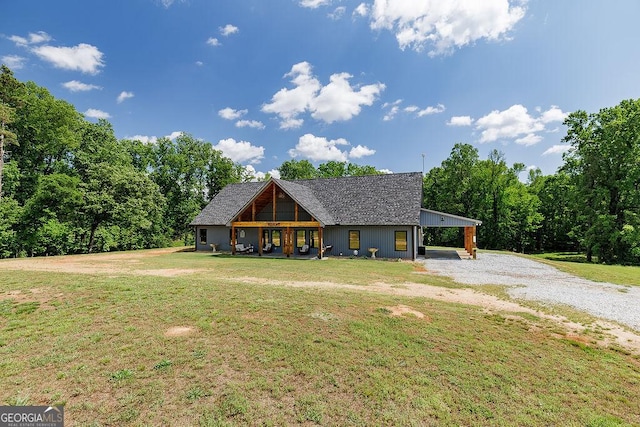 4059 Wildcat Bridge Rd, Royston, GA 30662 - cabin featuring driveway, a front yard, and a carport