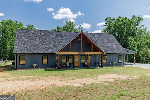 4059 Wildcat Bridge Rd, Royston, GA 30662 - rear view of house featuring a shingled roof and a yard