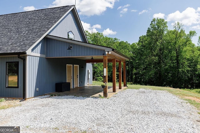 4059 Wildcat Bridge Rd, Royston, GA 30662 - view of front of house featuring roof with shingles and a carport
