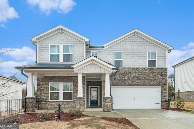 craftsman-style home featuring a garage and a porch