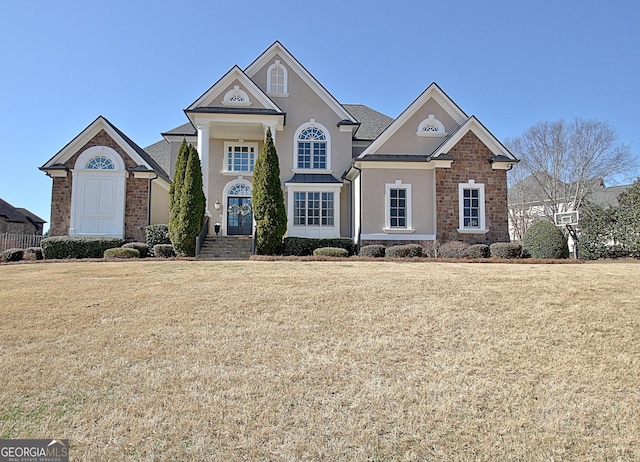 view of front facade featuring a front yard