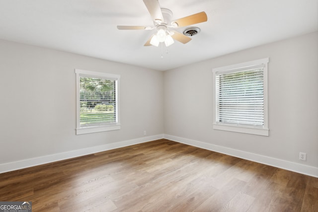 1142 New Point Peter Rd, Saint Marys, GA 31558 - unfurnished room featuring wood finished floors, baseboards, and ceiling fan
