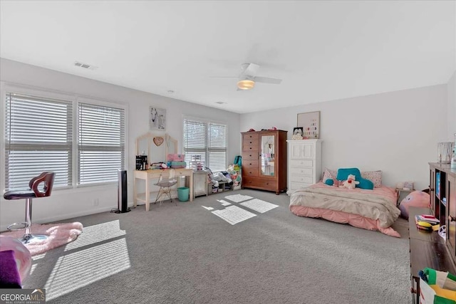 carpeted bedroom with ceiling fan