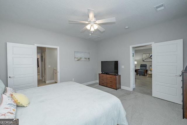 bedroom with light carpet and ceiling fan