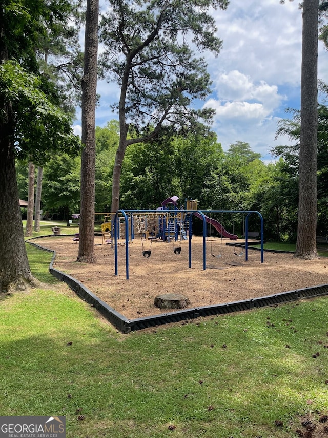 view of play area with a yard