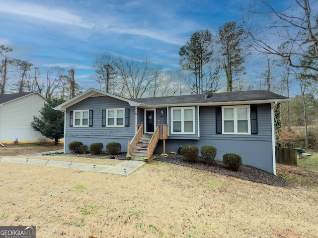 ranch-style home with a front yard