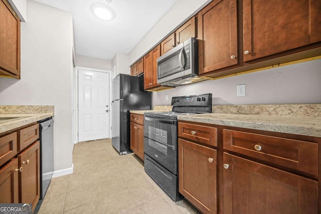 kitchen featuring black appliances