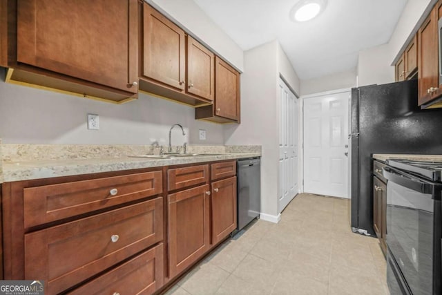 kitchen featuring sink, stainless steel dishwasher, and black / electric stove