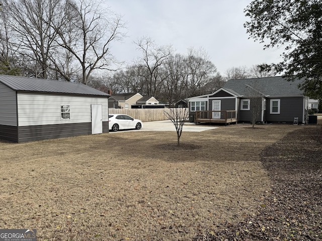 view of yard featuring a wooden deck