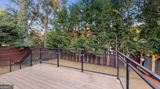 deck featuring a fenced backyard