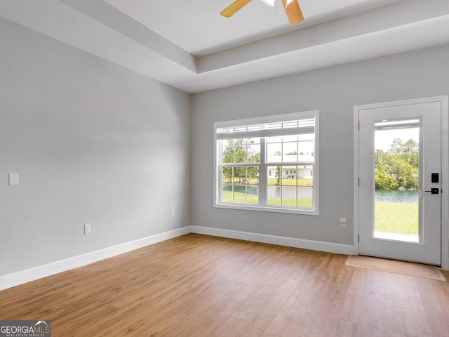 interior space with ceiling fan and light hardwood / wood-style floors