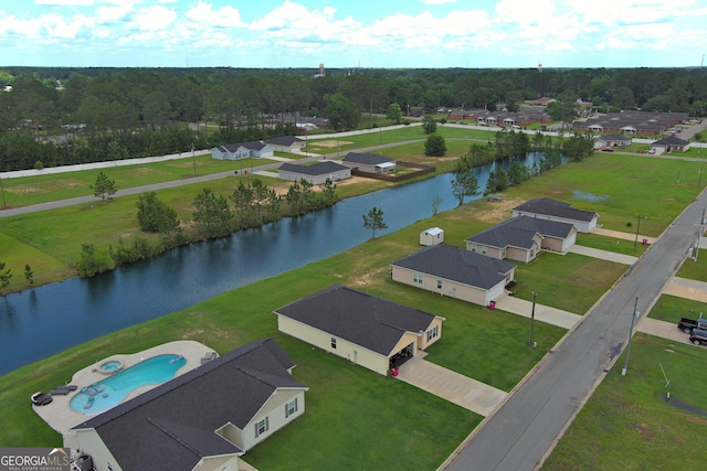 drone / aerial view with a water view