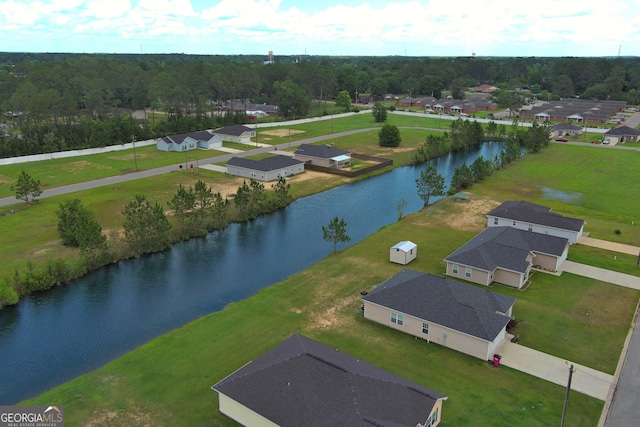 drone / aerial view featuring a water view