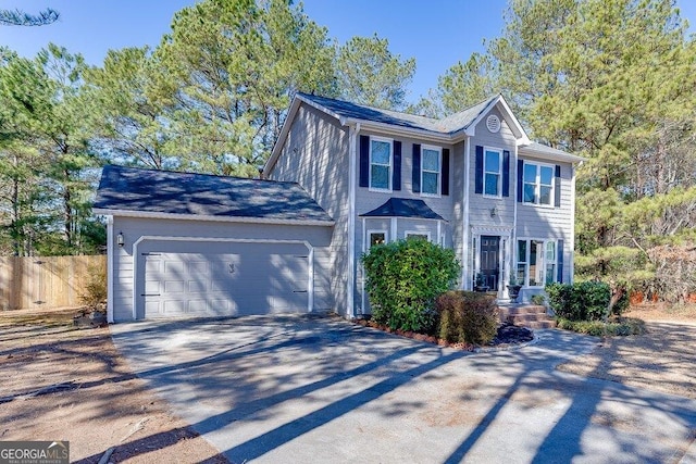 view of front of property featuring a garage