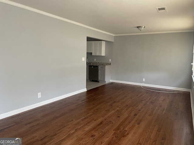 unfurnished living room with wood-type flooring and ornamental molding