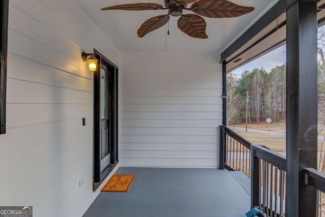 balcony featuring ceiling fan