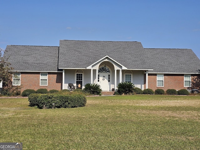 ranch-style home with a front yard