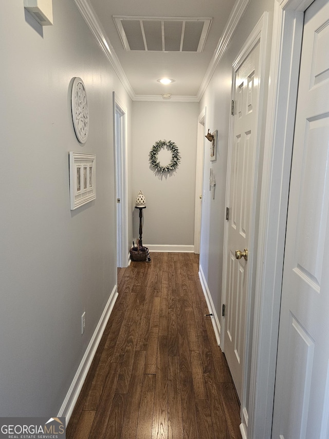 hallway featuring crown molding and dark hardwood / wood-style floors