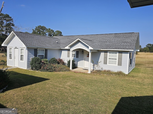 ranch-style house with a front yard