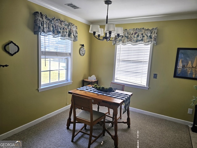 carpeted dining room with an inviting chandelier and ornamental molding