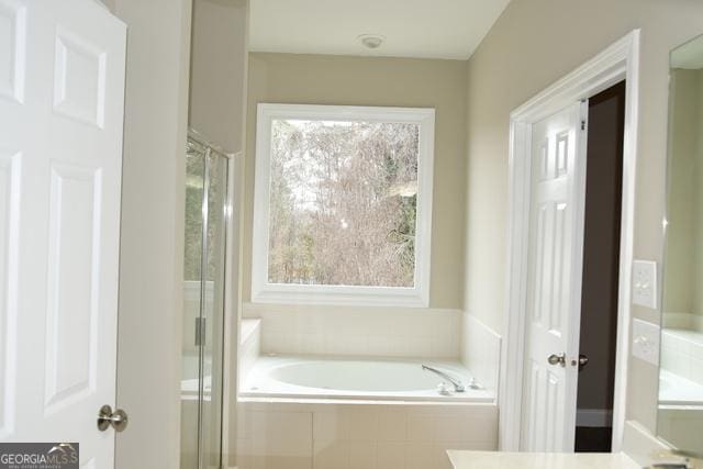 bathroom with plus walk in shower