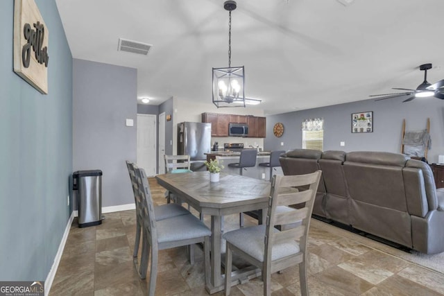 dining room featuring ceiling fan