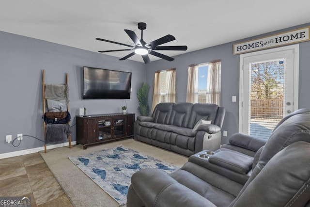 living room featuring ceiling fan