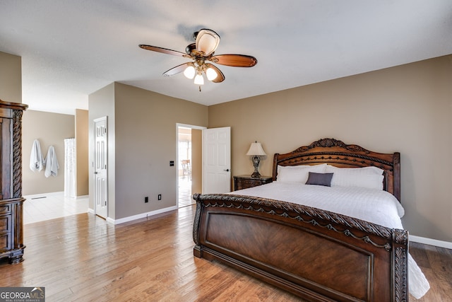 bedroom featuring light hardwood / wood-style floors and ceiling fan