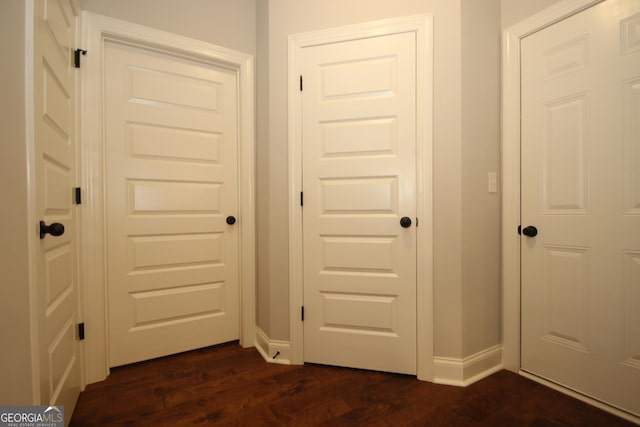 interior space with dark hardwood / wood-style floors