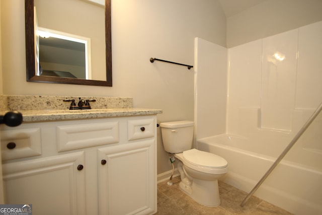 full bathroom featuring tile patterned floors, vanity, toilet, and tub / shower combination