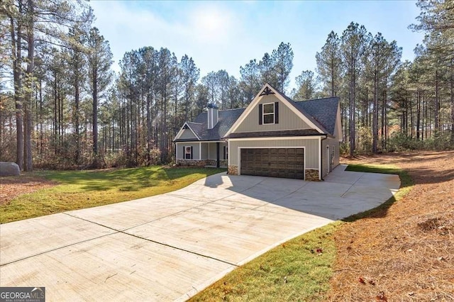 craftsman-style home with a garage and a front lawn