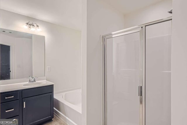 bathroom featuring vanity, separate shower and tub, and tile patterned flooring