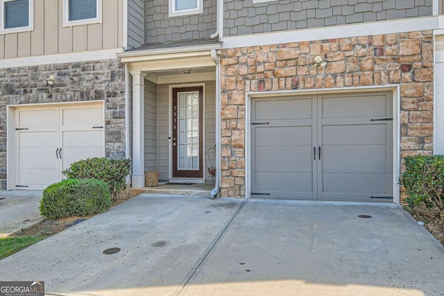 entrance to property featuring a garage