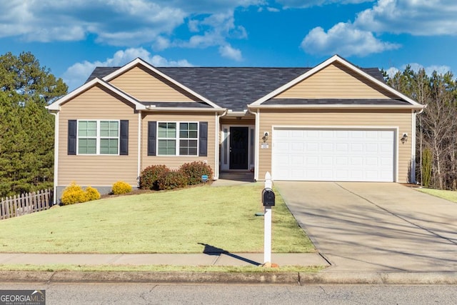 single story home featuring a garage and a front yard