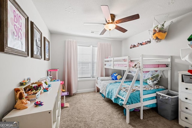 bedroom featuring ceiling fan and light colored carpet