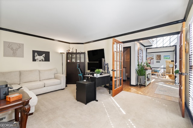 carpeted office featuring french doors and crown molding