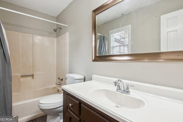 bathroom with toilet, shower / bathtub combination with curtain, and vanity