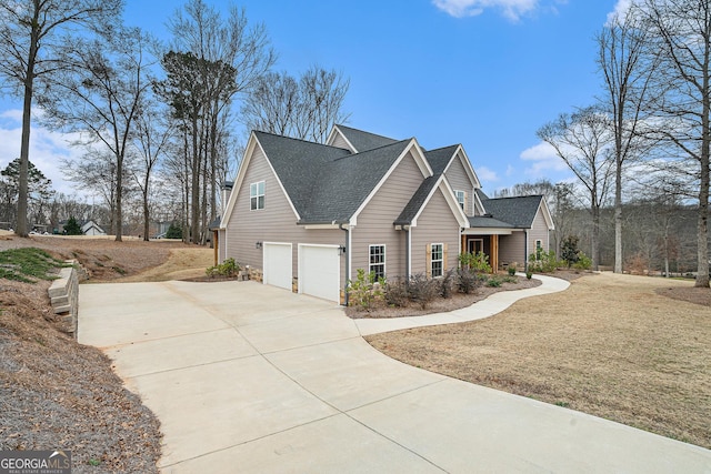 view of side of home with a garage