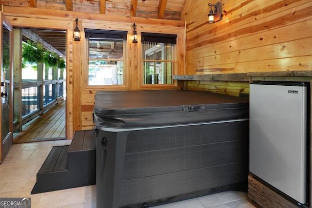 playroom featuring wood walls