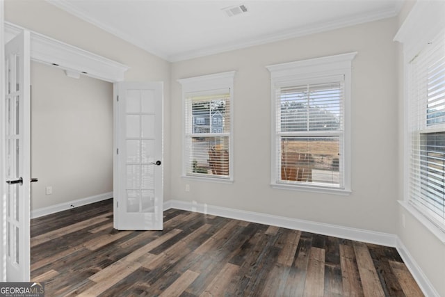 unfurnished bedroom featuring ornamental molding and dark hardwood / wood-style floors