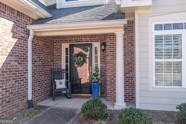 doorway to property with a porch